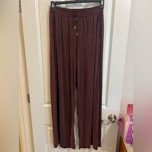 Lululemon burgundy with gold detail wide leg drawstring pant.